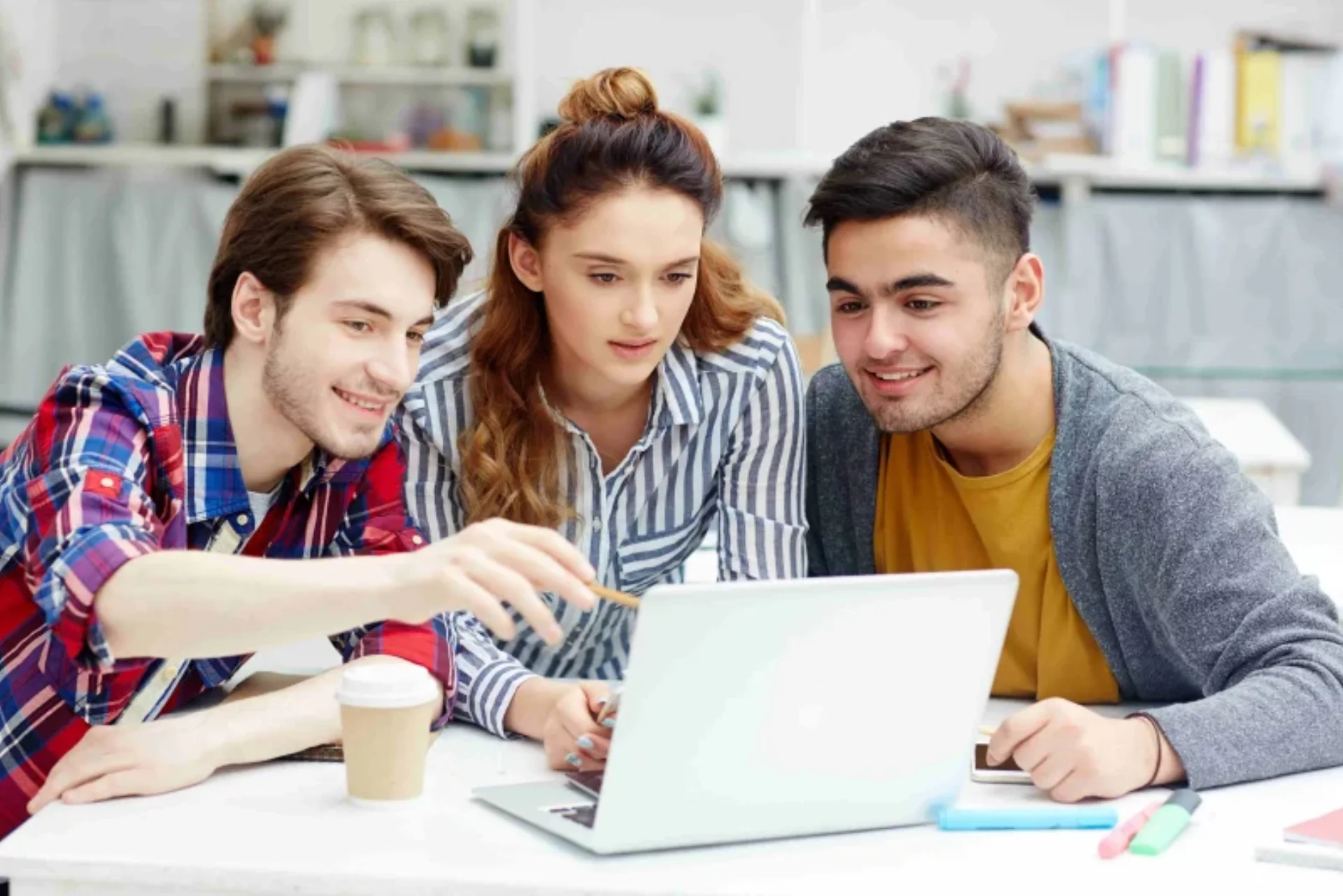 Students consulting with education advisor